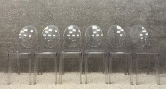 A set of six clear shock and weatherproof polycarbonate Louis Ghost chairs designed by Phillipe