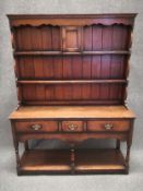 A mid to late 20the century Ipswich oak dresser by Titchmarsh and Goodwin with maker's marks. H.