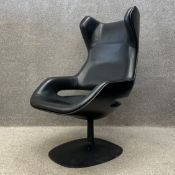 A contemporary Italian black leather Evolution armchair designed by Ora Ïto for Zanotta having an