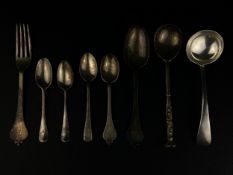 A collection of eight pieces of hallmarked silver cutlery to include a C.1900 Wakely & Wheeler
