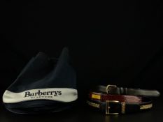 A mixed collection to include a vintage Burberry's bag along with two designer belts by Dior and