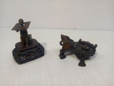 Two items to include a 20th century hand carved Japanese boxwood Netsuke figure in the form of a foo