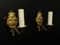 A pair of French 19th century style gilt metal wall sconces each having a scallop shell and