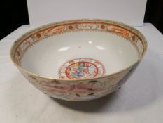 A large possibly 18th century Chinese export porcelain punch bowl having all-over hand painted