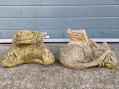 Two contemporary reconstituted stone figural garden ornaments to include a frog and a sleeping