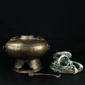 A collection of three metal items to include a 20th century Chinese sheet metal censer along with