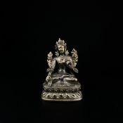 A 19th century Tibetan brass seated Buddha figure on a moulded plinth base. H.16cm