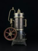 An early 20th century spirit fired vertical steam engine with gilt metal mounts and a cast 'GBN'