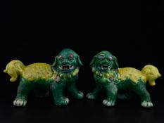 A pair of early 20th century Chinese Republic period export porcelain Foo Dogs or Temple Lions