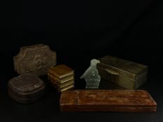 A 20th century Chinese copper box with inverted rounded corners having a pierced repousse lid with a