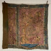A 19th century Chinese silk needlework tapestry having a large hand embroidered figural Foo Dog or
