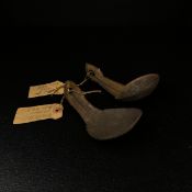 Oceania interest; two carved coconut spoons with abstract figural handles from the tribal people