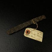 Oceania interest; a piece of 18th or 19th century plaited twist tobacco with an accompanying hand