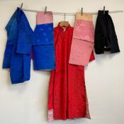 A collection of 20th century traditional Chinese children's clothing to include three needlework