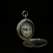An early 20th century military issue pocket compass with a white, black and red dial in a polished