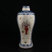 An 18th century style Chinese Famille Rose export porcelain baluster form vase hand painted with