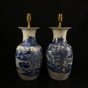 A pair of Chinese Republic period hand painted blue and white porcelain baluster vases mounted