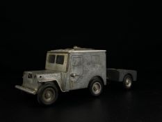 A 1940's hand machined aluminium Baier Ges Gesch Company Willy’s Jeep table lighter and cigarette