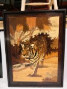 A mid century marquetry inlaid hardwood panel depicting a prowling tiger in a jungle landscape.