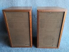 A pair of mid century teak Realistic Electrostat - 2a speakers. H.57 W.33cm