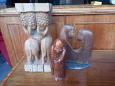 Three items to include a 20th century Eastern teak stool carved with a figure group of elephants