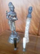 A mixed collection of items to include a gilt spelter Eastern figure along with a carved bone vessel