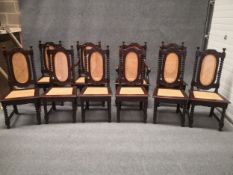 A set of ten 20th century Jacobean style dining chairs to include two carvers each having a shaped