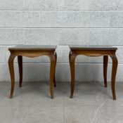 A pair of 19th century French walnut side tables each having a square moulded top set with a piece