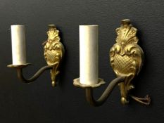 A pair of French 19th century style gilt metal wall sconces each having a scallop shell and