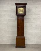 A 19th century oak longcase clock by William Porthouse of Penrith having a moulded cornice over
