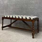 An early 20th century Utility Furniture Scheme oak Ottoman or footstool having a rectangular