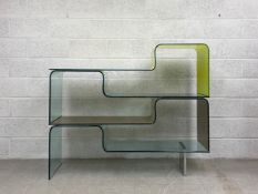 A contemporary Italian modular Kurl bookcase comprised of an interchangeable stack of four bent