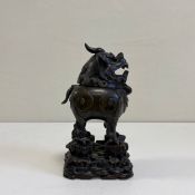 A 19th century or earlier Chinese figural bronze Luduan censer or incense burner in the form of a