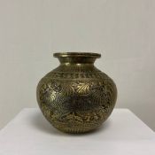 A 19th century South Indian brass Lota or water vessel having a short flared fluted neck over a