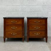 A pair of 19th century French walnut side tables each having a rectangular marble top above three