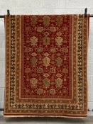 A 20th century Afghan Ziegler Farahan rug having a repeating foliate and flowerhead field in