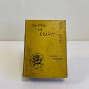 An early 20th century third edition hardback copy of 'China in decay: The Story of a Disappearing