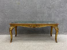 A mid 20th century French style coffee table having a rectangular green marble top set into a