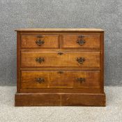 A 19th century pine chest of drawers having a rectangular top above two short over two long