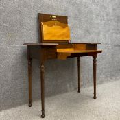 An early 20th century walnut and crossbanded 'The 