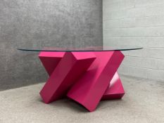 A contemporary Megalith Round Edition 2016 centre or dining table having a circular toughened