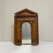 A 20th century wall hanging mirror having a to-scale architectural model archway frame with a dentil