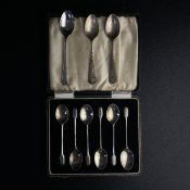 A collection of nine 20th century hallmarked silver teaspoons to include a pair with repousse