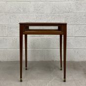 A late 19th century mahogany display table vitrine having a rectangular crossbanded case glazed on
