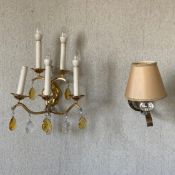 Two contemporary wall sconces to include one gilt metal with five scrolling branches and faux candle