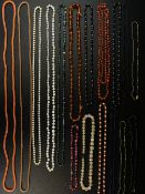 A collection of seventeen miscellaneous glass and other beaded necklaces. L.73cm