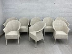 A set of eight 20th century Lloyd Loom style painted wicker tub chairs. H.90cm