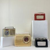 A collection of four mid century retro analogue radios to include Bush, Ultra and two by Roberts.