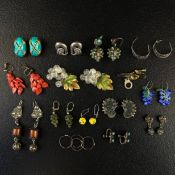 A mixed collection of jewellery to include fourteen pairs of carved coral, turquoise, cut glass,
