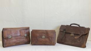 A collection of three early 20th century leather satchels to include two fitted with medical
